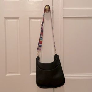 Adorable crossbody with interchangeable straps.